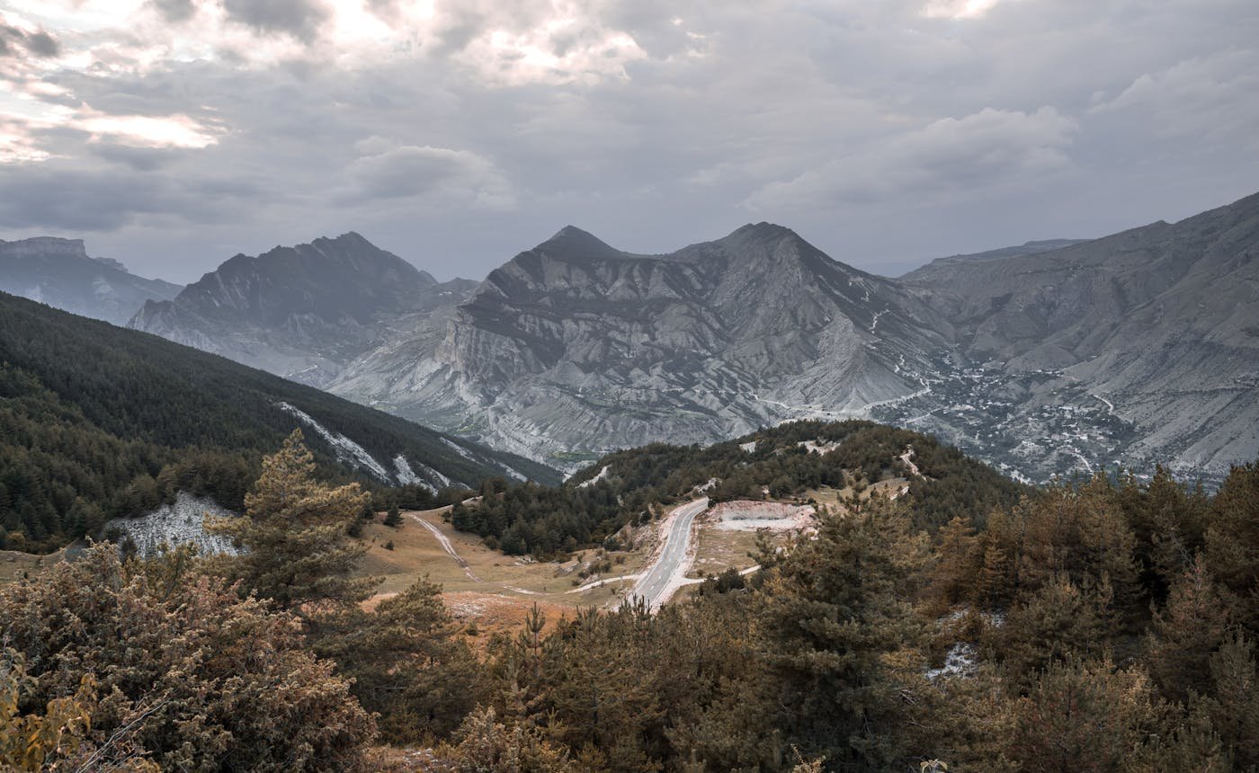 A winding mountain path at first light