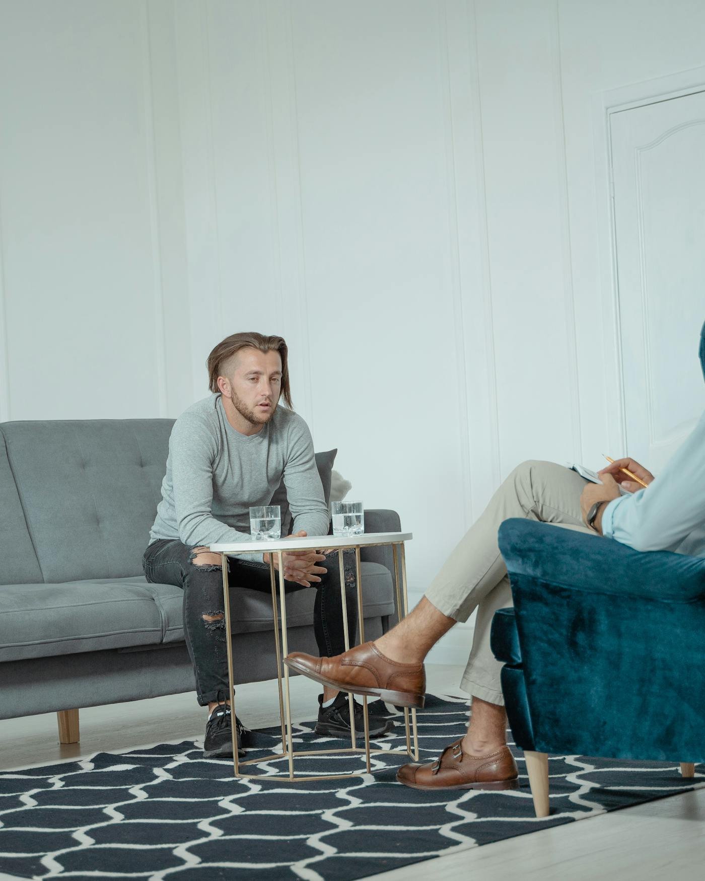 Two men in honest conversation — a quiet moment of talking and listening