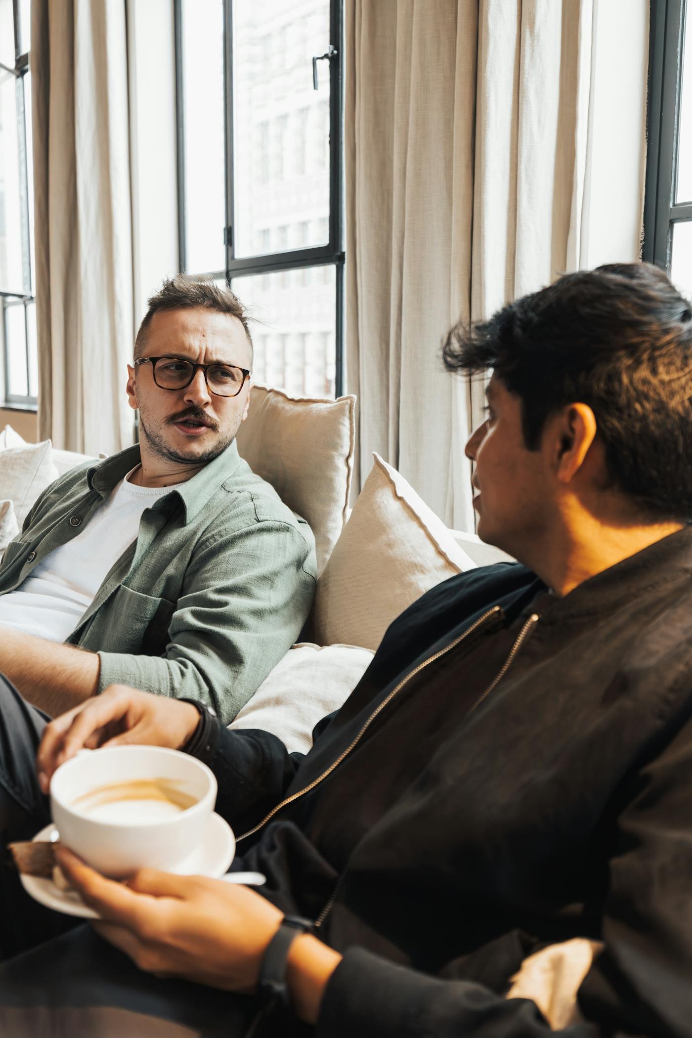 Men in honest conversation — talking together, moving forward